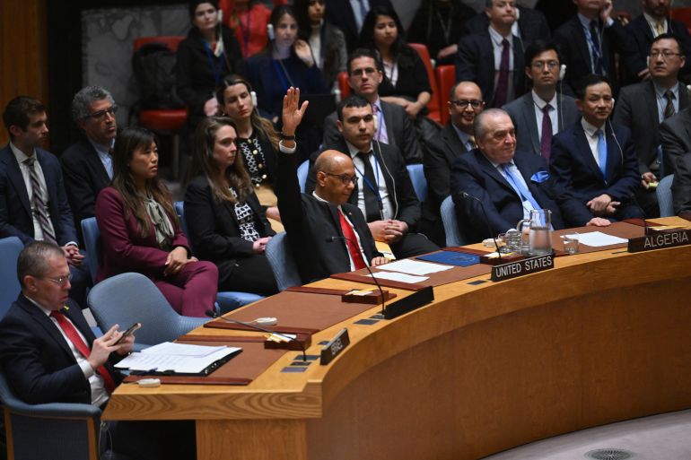 US Deputy Ambassador to the UN Robert Wood votes against a resolution allowing Palestinian UN membership at United Nations headquarters in New York, on April 18, 2024, during a United Nations Security Council meeting on the situation in the Middle East, including the Palestinian question. - The United States vetoed a Security Council measure on a Palestinian bid for full United Nations membership. The draft resolution, which was introduced by Algeria and "recommends to the General Assembly that the State of Palestine be admitted to membership of the United Nations," received 12 votes in favor, two abstentions and one against. (Photo by ANGELA WEISS / AFP)