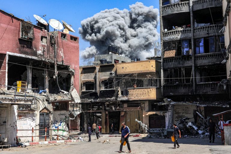 A smoke plume rises during Israeli bombardment in Jabalia in the northern Gaza Strip on May 14, 2024 amid the ongoing conflict in the Palestinian territory between Israel and Hamas. (Photo by AFP)